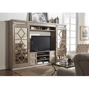 Falzone Entertainment Center for TVs up to 65 by Ophelia & Co.
