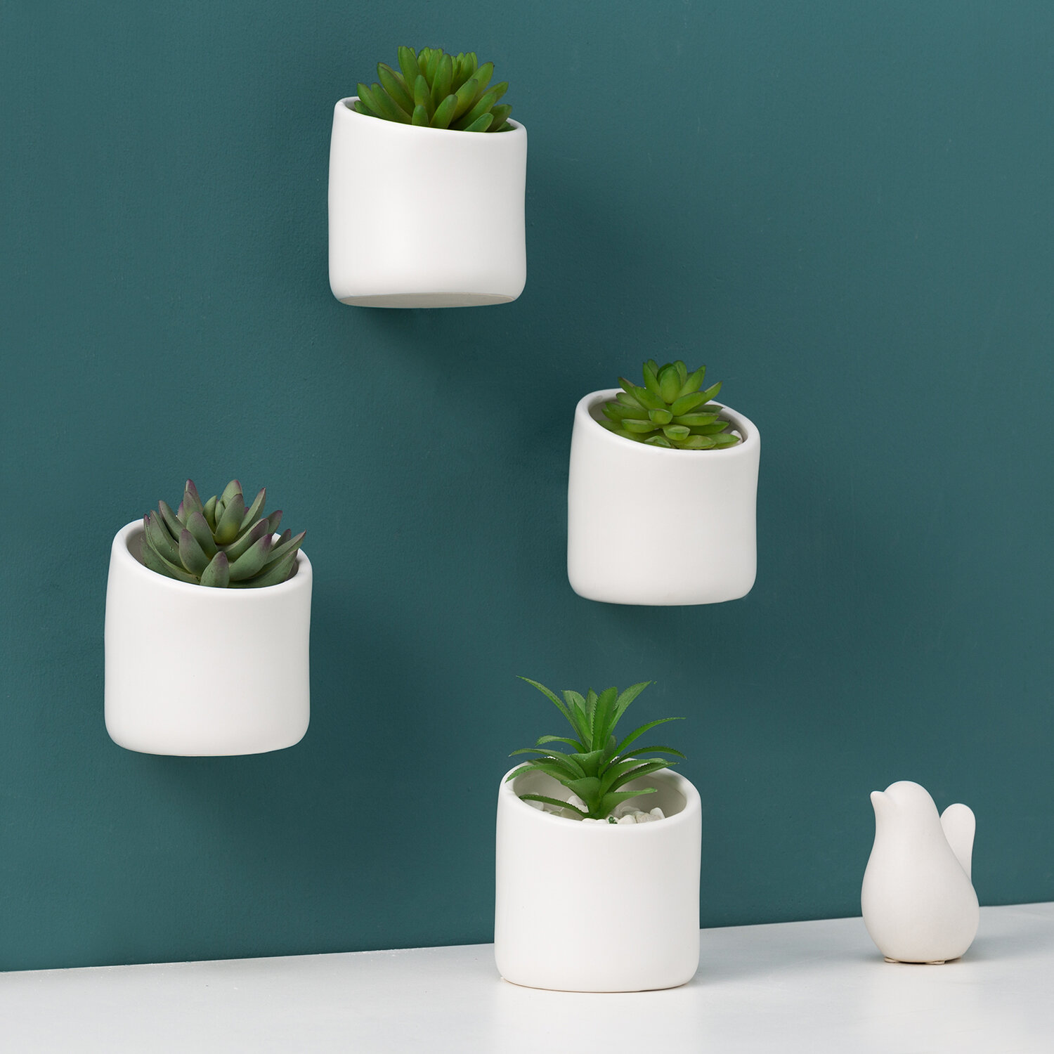 Wade Logan Kangley 4 Piece Ceramic Wall Planter Set Reviews Wayfair