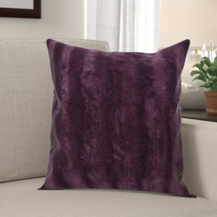purple fuzzy pillow