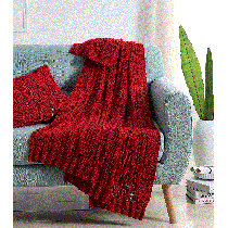 red throw blanket and pillows