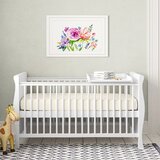 white wooden cot bed with mattress