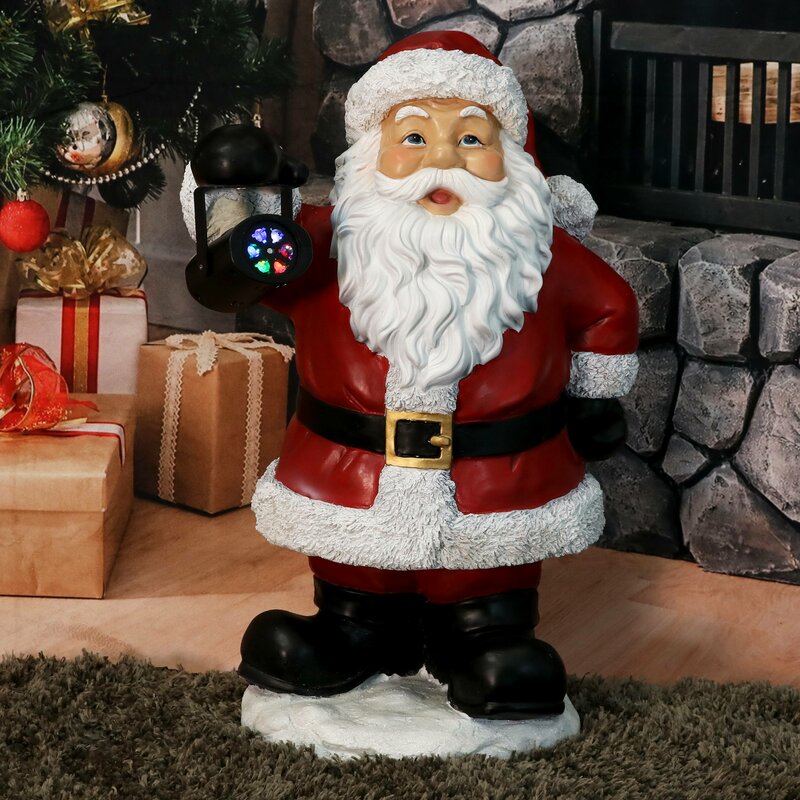 The Holiday Aisle® Journeying Santa Claus Statue Polyresin Figurine ...