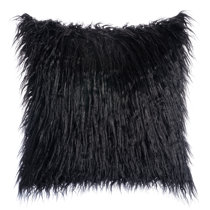 black fuzzy pillow