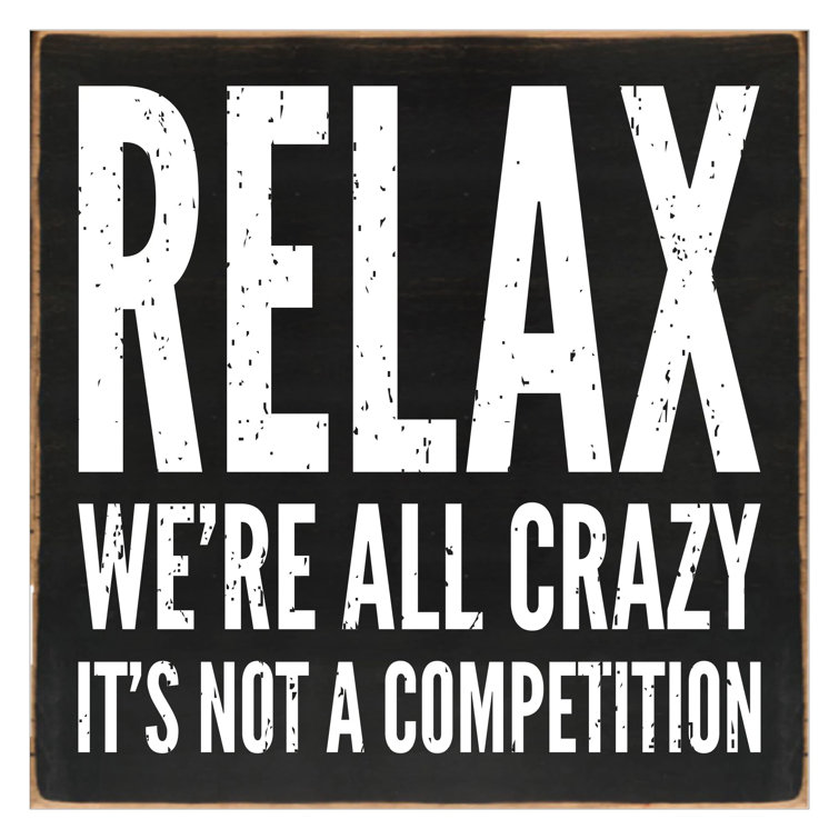 Trinx Relax Were All Crazy Its Not a Competition Wooden Wall Décor