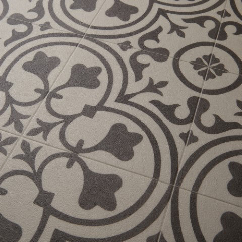 Fleur De Lis Living Ceres Deco Vinyl Wrought Iron Beige Area Rug Ceres Deco Vinyl Wrought Iron Beige Area Rug