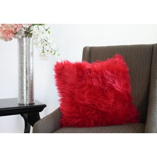 red fuzzy pillow