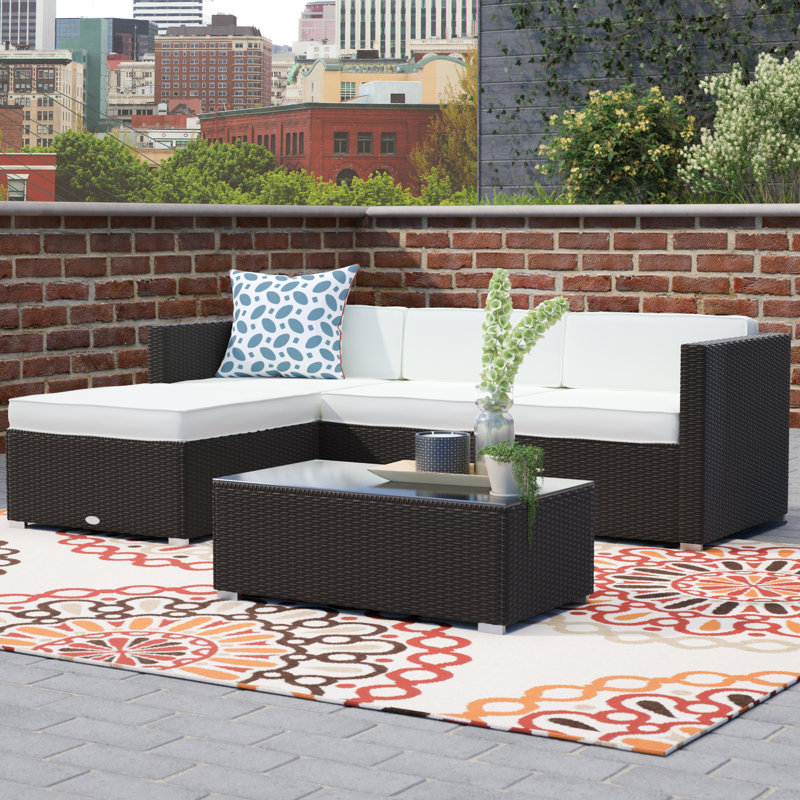 Hazen 5 Piece Rattan Sectional Seating Group with Cushions