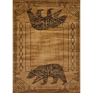 Sayre Bear Cave Gold/Black Area Rug