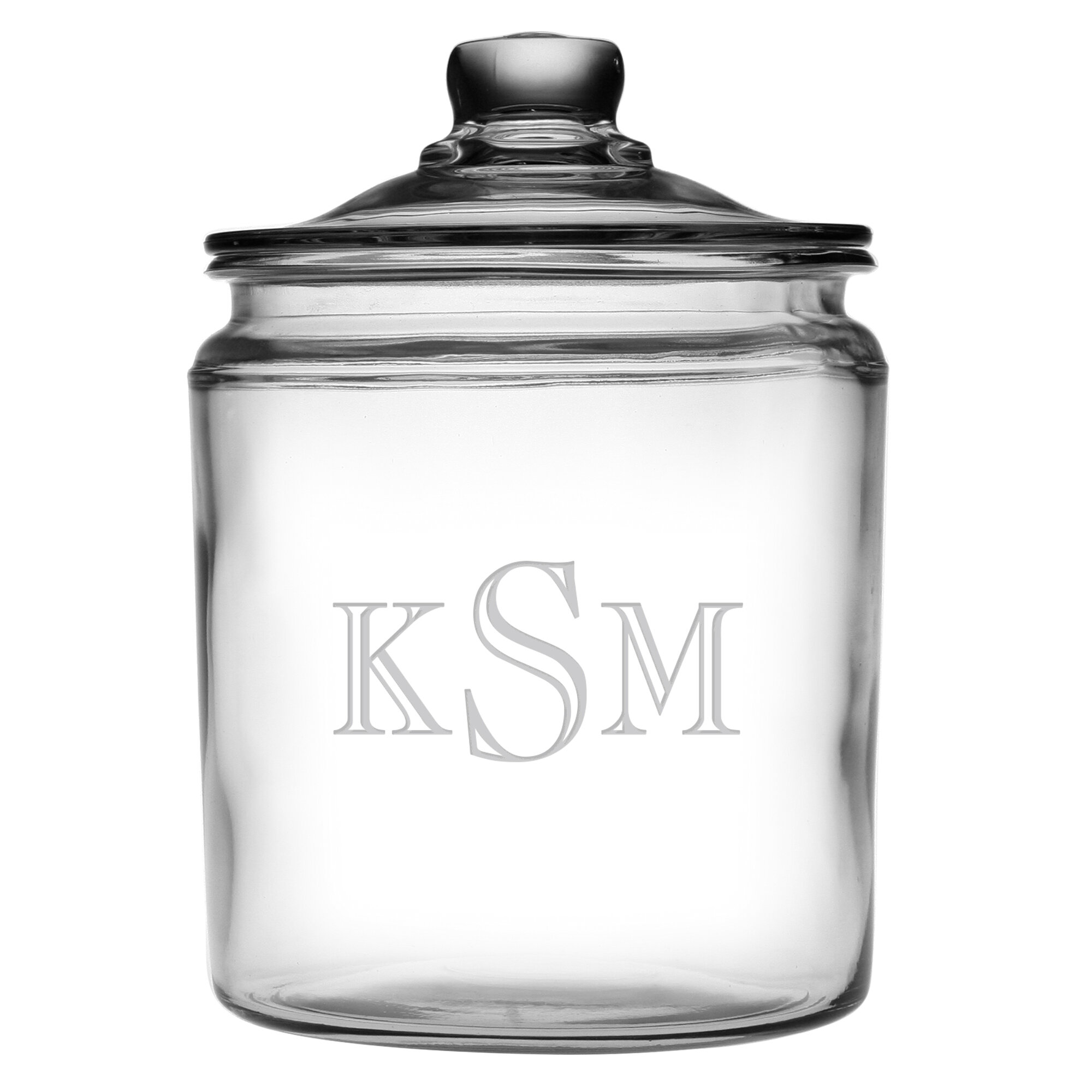 Showcasing a sand-etched typographic motif, this charming lidded glass jar ...