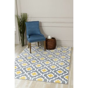 Tobis Yellow Indoor/Outdoor Area Rug