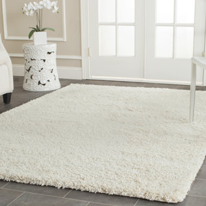 Yoan Handmade Shag and Flokati Ivory Area Rug