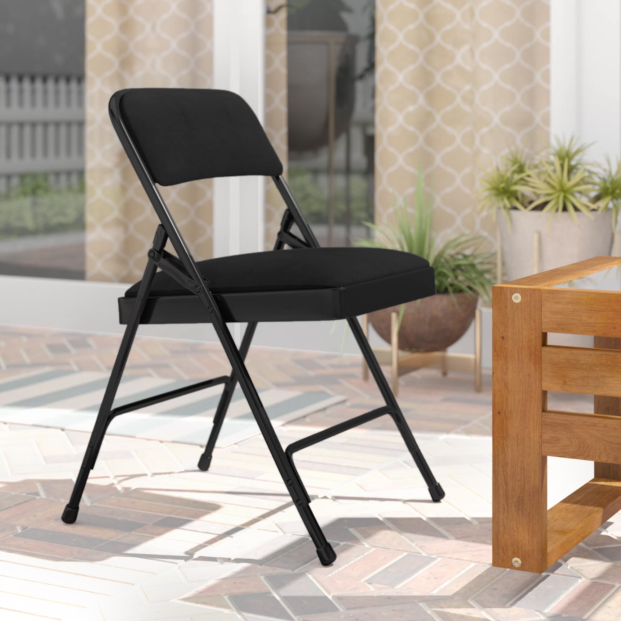 black padded folding chairs