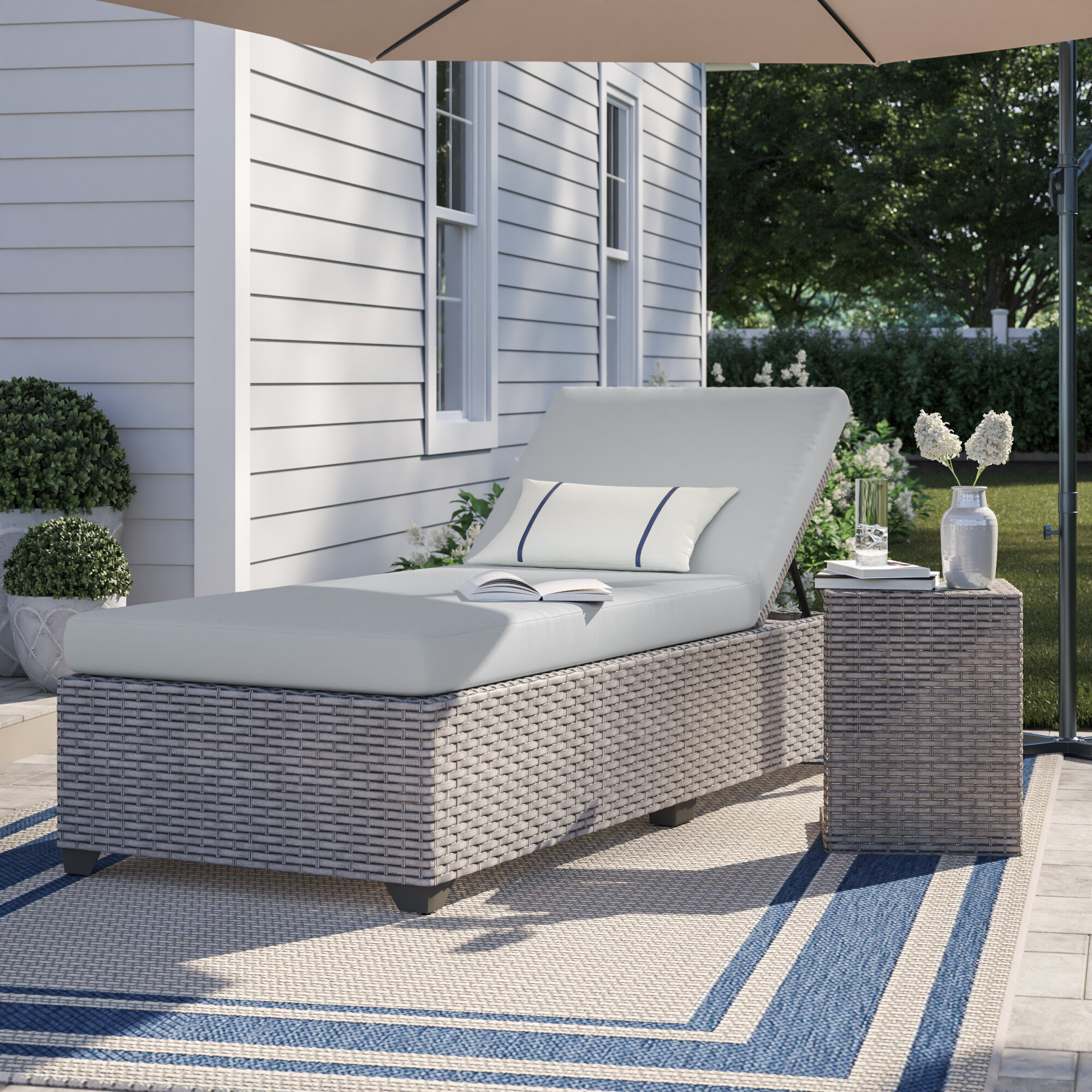 grey wicker outdoor chaise lounge