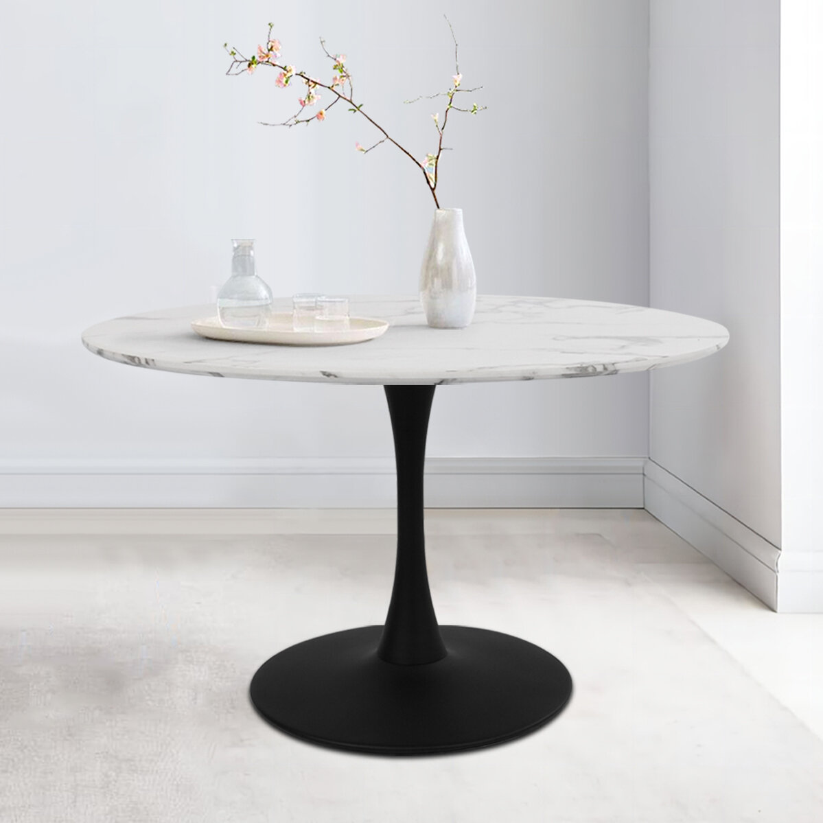 black oval pedestal dining table