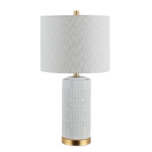 gold and white bedside lamp