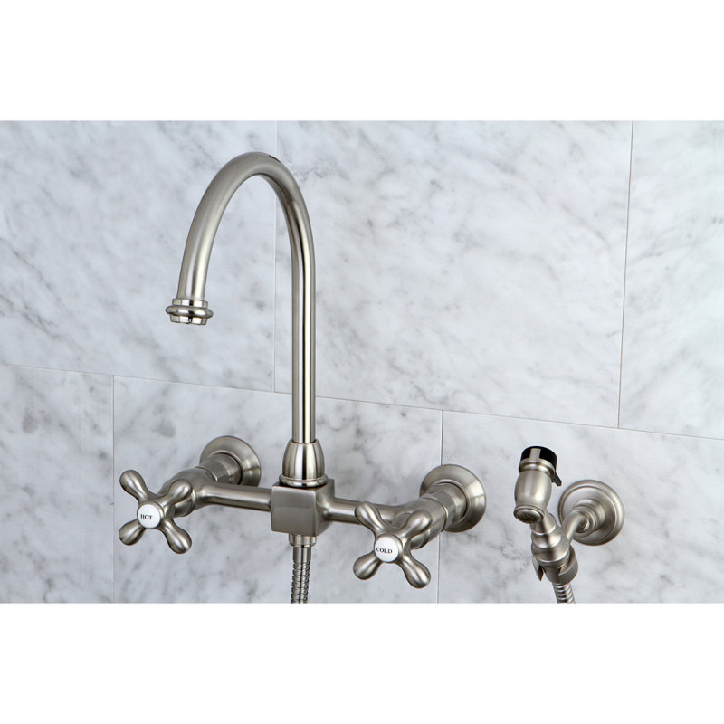 Kingston Brass Restoration Wall Mount Double Handle Kitchen Faucet