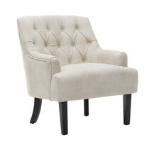 small cream arm chair