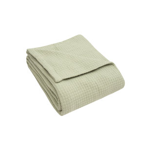 green cotton blanket