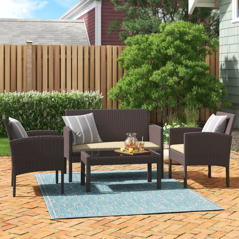 World Menagerie Tessio 4 Piece Rattan Sofa Seating Group With Cushions Reviews