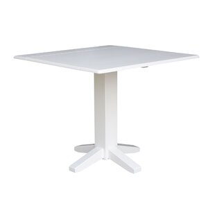 https://secure.img1-fg.wfcdn.com/im/08594843/resize-h310-w310%5Ecompr-r85/1213/121310295/Runkle+Drop+Leaf+Rubberwood+Solid+Wood+Pedestal+Dining+Table.jpg