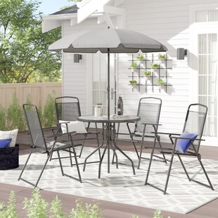 patio table with umbrella hole and chairs
