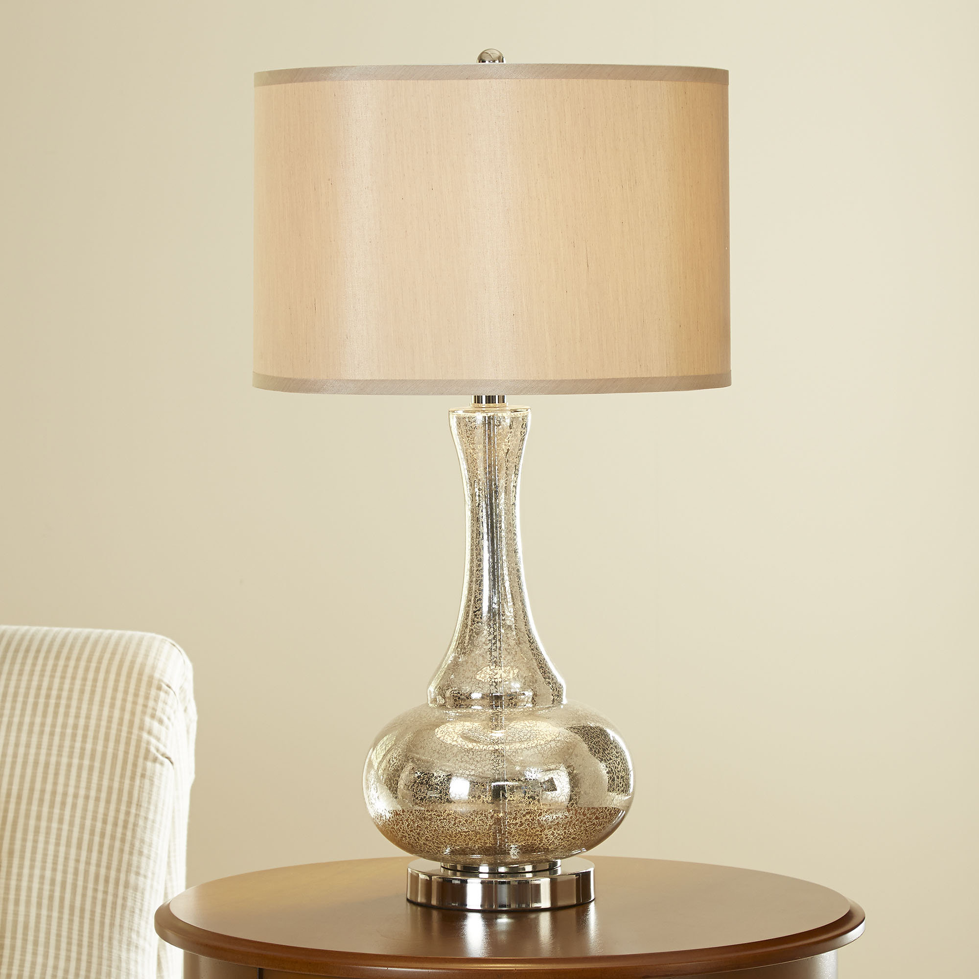 silver and gold lamp