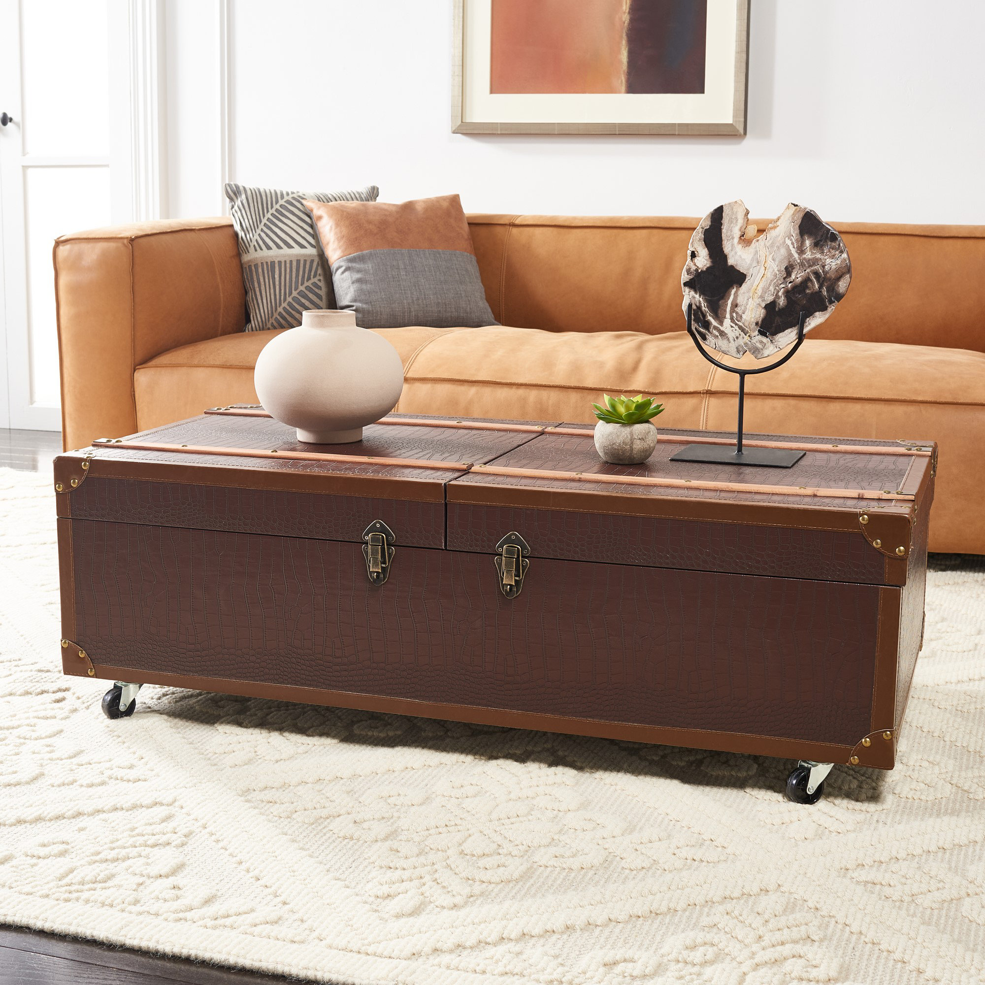 World Menagerie Rocker Extendable Wheel Coffee Table with Storage ...