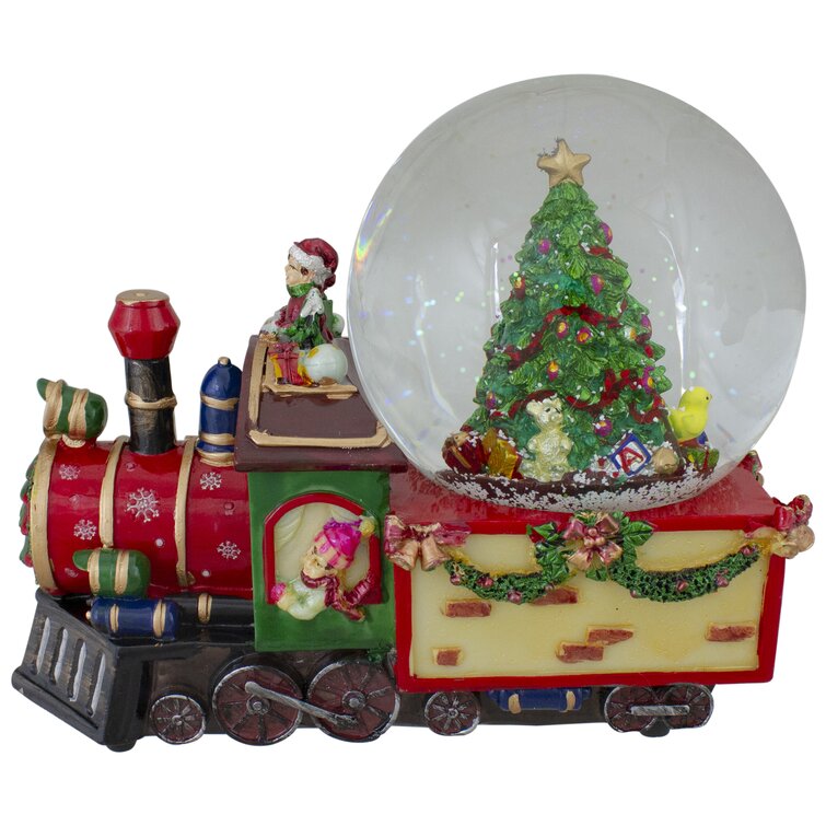 christmas tree with train inside