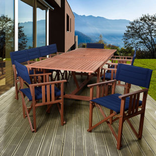 Go to store & view more images Foss Extendable Patio 11 Piece Dining Set by Beachcrest Home