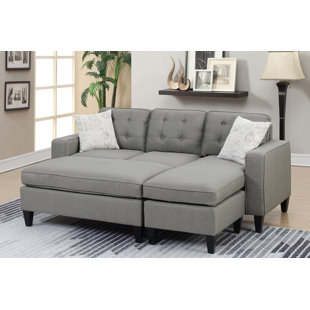 Go to store & view more images Ellensburg Reversible Sectional with Ottoman by Ebern Designs