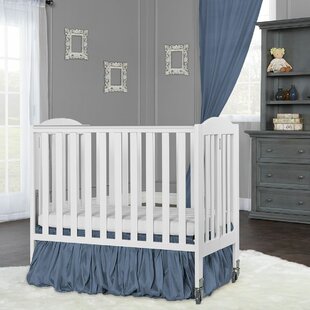 crib with fold down front