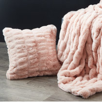 blush fur pillows