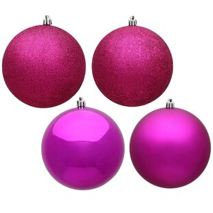 This Item Comes with 4 Ornaments per Unit. Vickerman 4.75 Clear Ball Christmas Ornament with Fuchsia Glitter Interior 