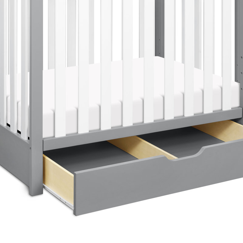 mini crib with storage underneath