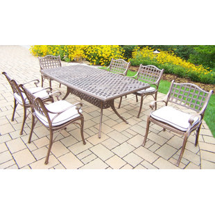 Go to store & view more images Thelma 7 Piece Traditional Dining Set with Cushions by Astoria Grand