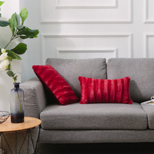 red couch with pillows