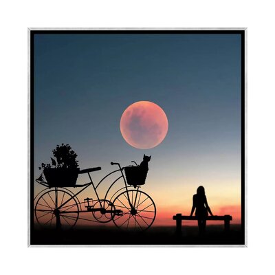 Girl on a Bicycle by Abdullah Evindar - Photograph Print East Urban Home Format: Silver Frame Canvas, Matte Color: No Matte, Size: 26