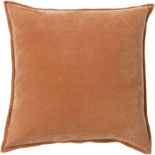 orange and beige pillows