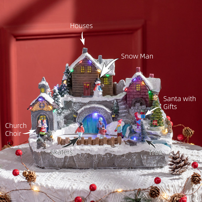 The Holiday Aisle® Christmas Village Skating Pond Animated Winter 