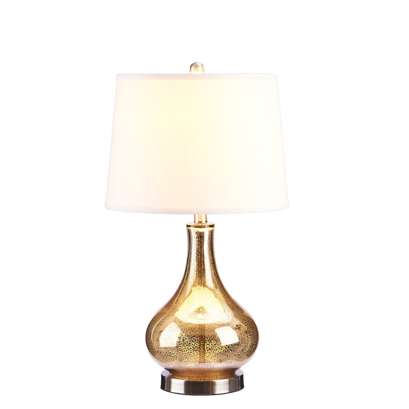 glass and gold table lamp