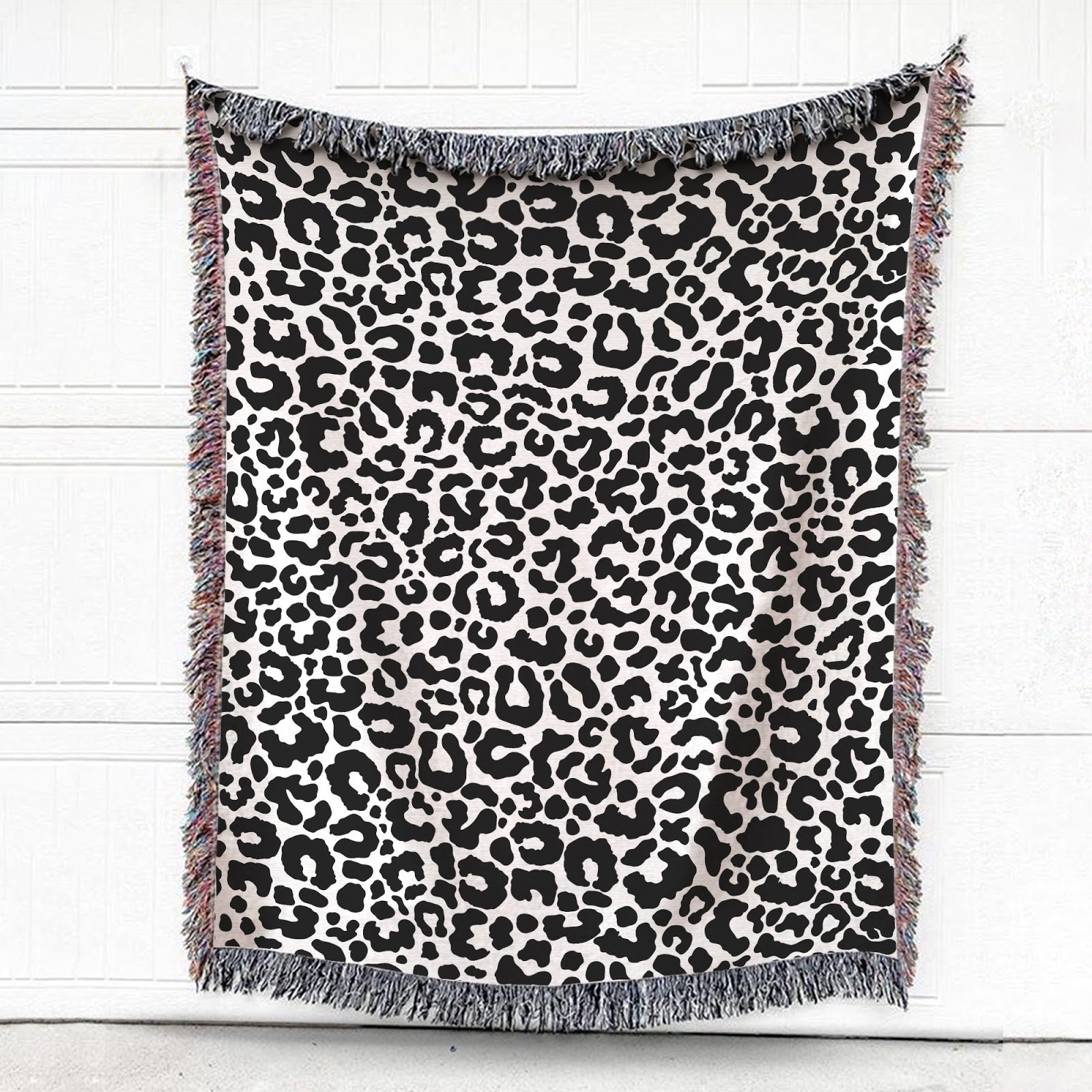 white leopard print blanket