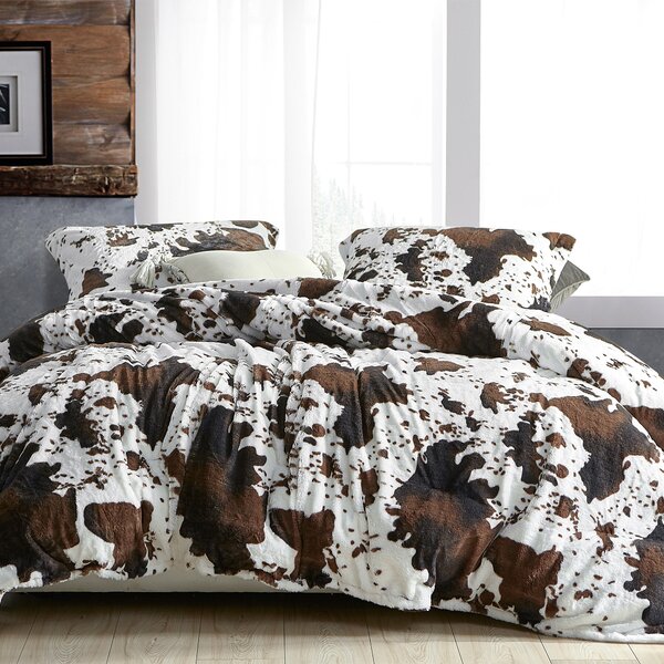 brown and white duvet