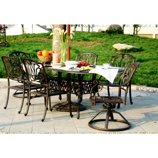 Go to store & view more images Puig Oval 7 Piece Dining Set with Sunbrella Cushions by Canora Grey