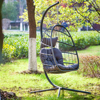 Bayou Breeze Halleck Patio Wicker Hanging Egg Swing Chair With