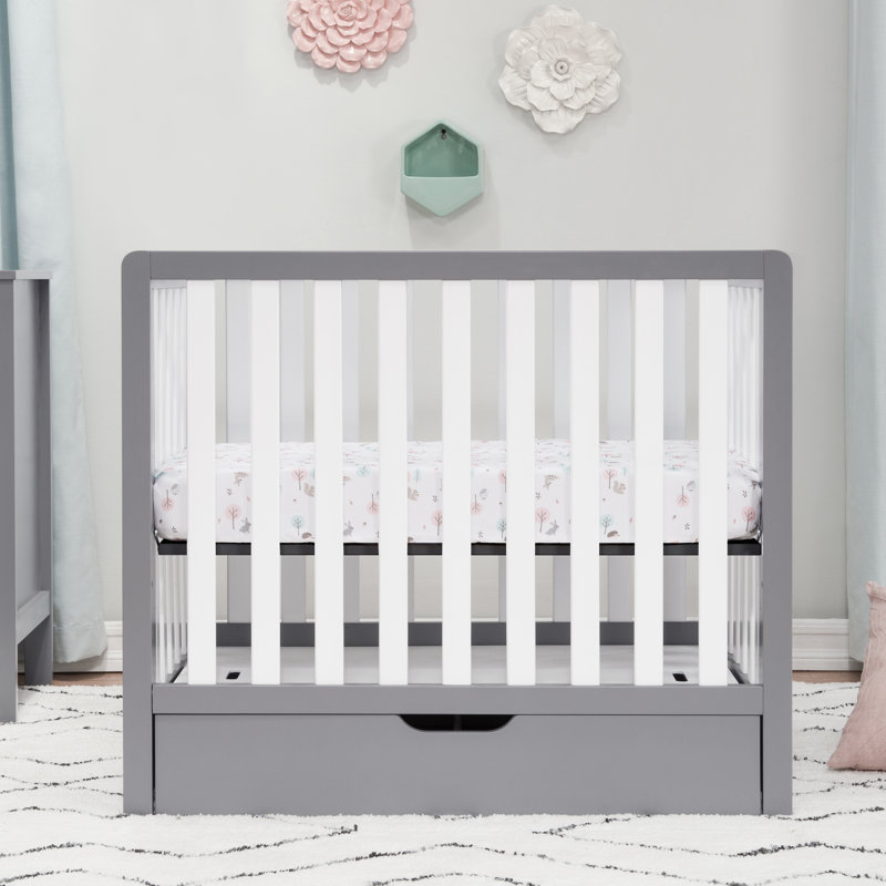 mini crib with storage underneath