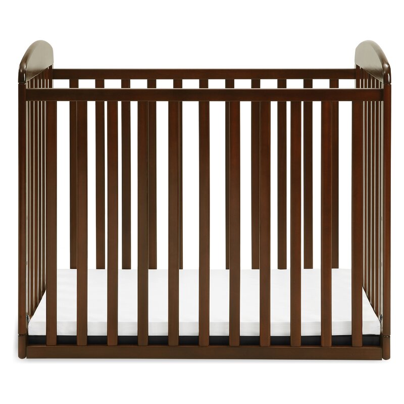 davinci alpha mini rocking crib in white