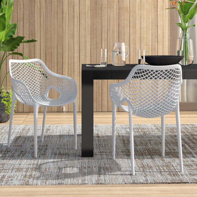 curnutt stacking patio dining armchair