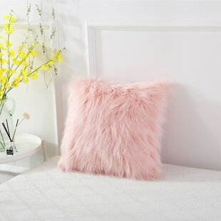 blush fluffy cushions