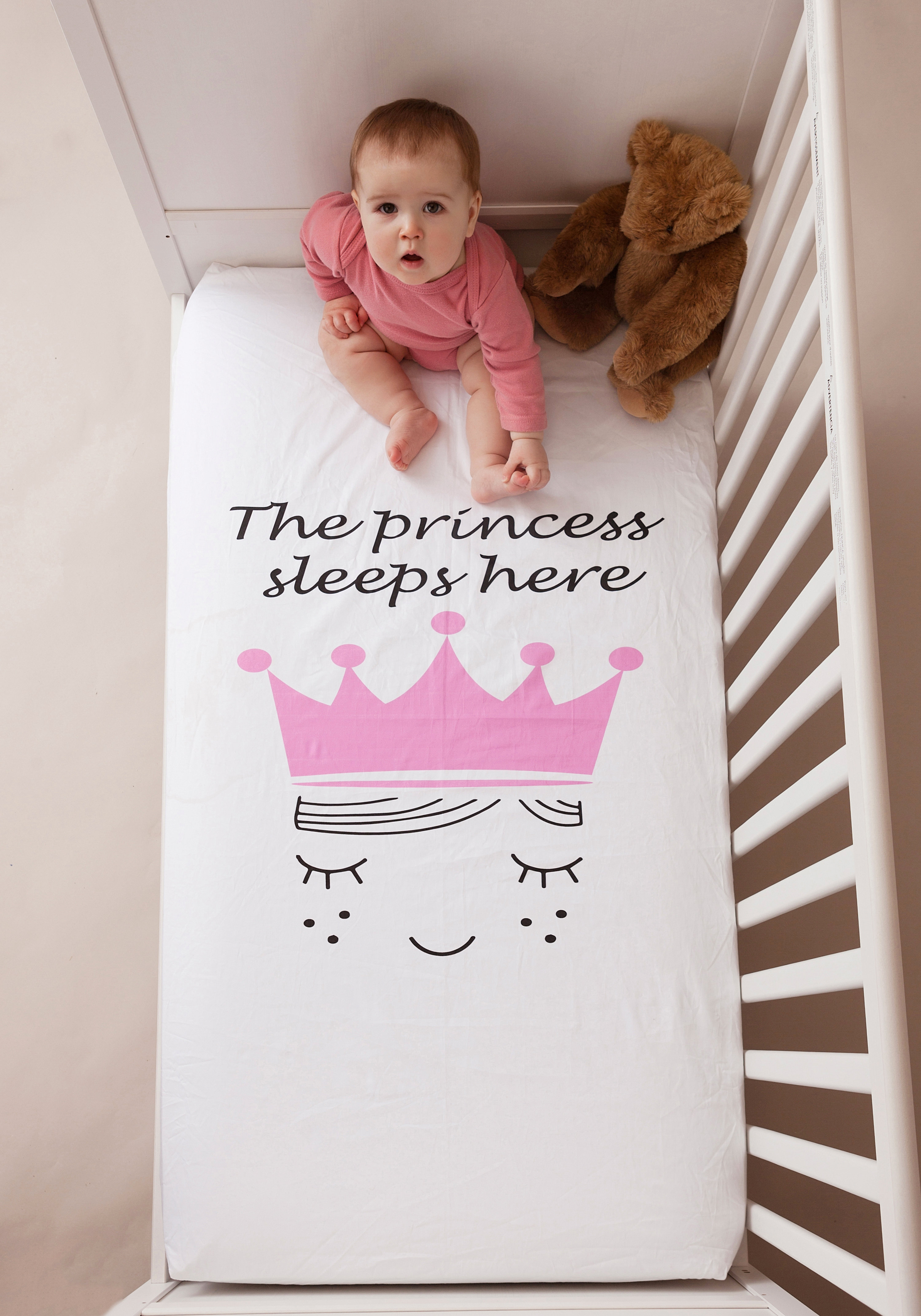 crib sheet protector with snaps