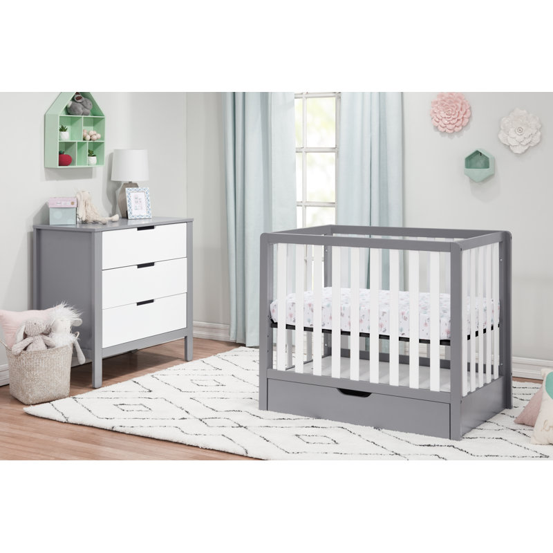 mini crib with storage underneath